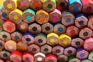 Different color pencils as background, closeup view