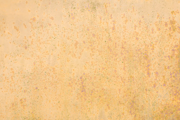 Yellow beige background putty on the wall