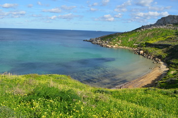 Mediterranean coastline and cliffs of Malta and Gozo.