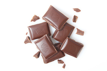 pieces of chocolate isolated on white.