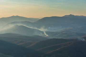 Fantastic views of the evening and morning mountain ridge with tourists and tents