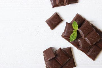 Pieces of chocolate on the table.