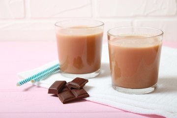 chocolate milk in a glass on the table. 