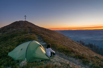 Fantastic views of the evening and morning mountain ridge with tourists and tents