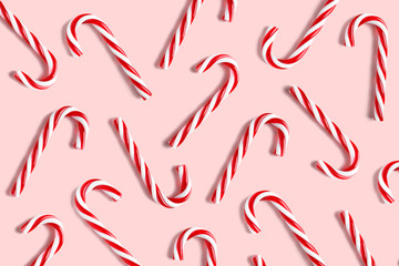 Candy cane for party design on pink background. - Powered by Adobe