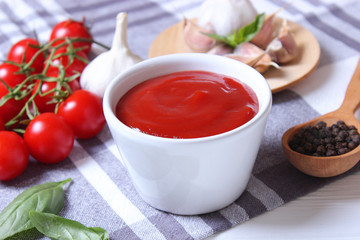 ketchup on the table. Tomato sauce, fresh tomatoes, spices.