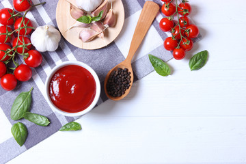 Ketchup on the table top view. Tomato sauce, fresh tomatoes.