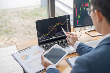 Business team investment trading do this deal on a stock exchange developing new approaches.