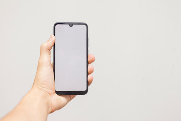 Man using a phone on white background.
