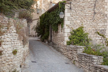 Fototapeta na wymiar Alley in the old town of Gordes, Vaucluse, Provence-Alpes-Cote d'Azur, France, Europe