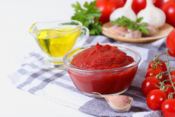 Tomato paste of fresh tomato on the table.