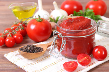 Tomato paste of fresh tomato on the table.