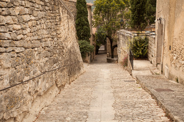 Fototapeta na wymiar Medieval alley in the old town of Bonnieux, Vaucluse department, Provence-Alpes-Côte d'Azur region, France, Europe