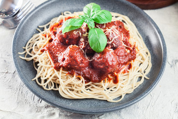 Spaghetti pasta with meatballs and tomato sauce