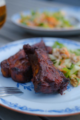 Thick ribs on a plate ready to be eaten