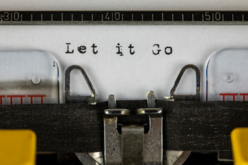 old typewriter with text let it go