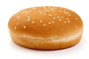 Delicious burger buns with sesame seeds, ingredients for burger, isolated on white background
