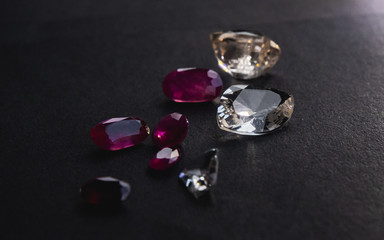 Collection of Red ruby and topaz, Precious stones for jewellery on black background