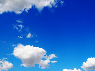 Naklejka na ściany i meble cumulus clouds against the blue sky