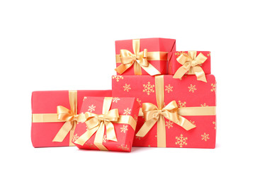 Gift boxes with golden bow isolated on white background