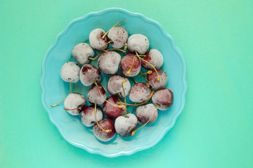 cherry berries cherries frozen by frost on a bright background