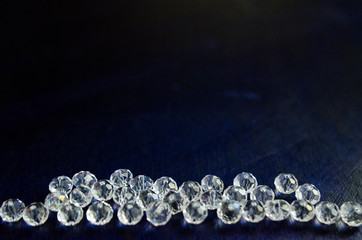 diamonds crystal glass beads on blue background