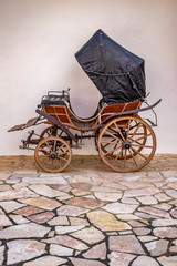 Fototapeta na wymiar Old carriage in medieval castle Veliki Tabor, northern Zagorje, Croatia, sunny summer day
