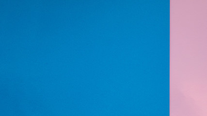 Color papers geometry flat composition background with blue and pink tones