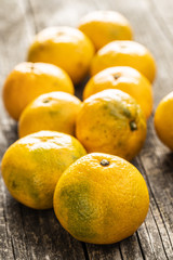 Fresh yellow tangerines.