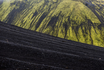 Moss covered black volcanic mountains near Langisjor Iceland