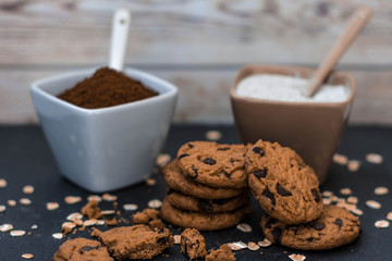 cup of coffee and cookies on wooden table