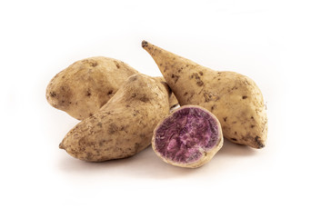 okinawan sweet potatoes on white background