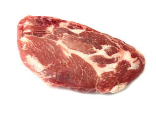 piece of raw pork meat on a white background