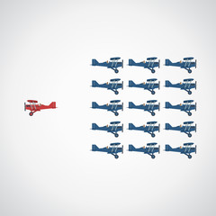 Think differently concept. Be different. Red airplane changing direction. New idea, change, trend, courage, creative solution, innovation and unique way concept.