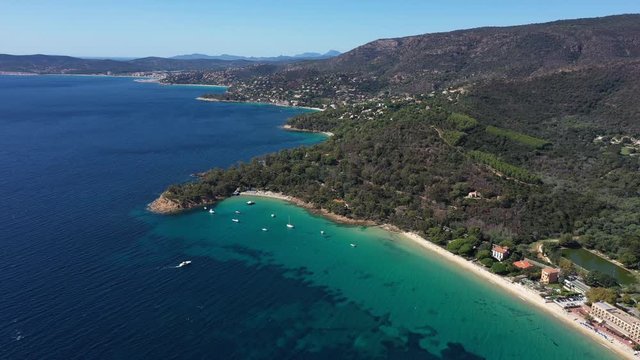 Aerial drone view of a beach arriving at Layet sandy beach naturist french riviera France sunny day 