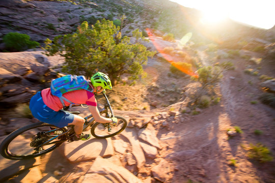 One woman enjoying the technical riding and stunning views on Captain Ahab, Moab, Colorado.