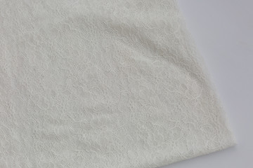 Obraz premium the background texture of the fabric . the fabric is knitted. the fabric is chiffon.