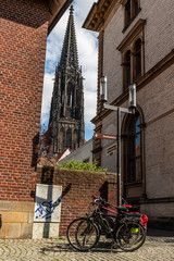 Two bikes in front of St Lambert's Church in Munster