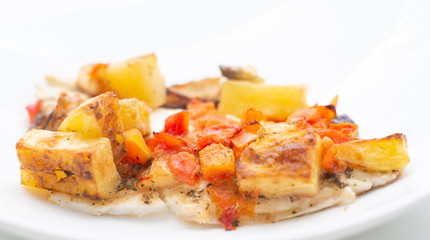 fish with potatoes, baked sea bream