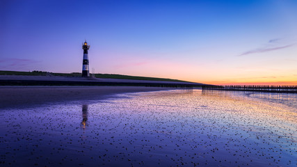 Lighthouse Nieuwe Sluis in the dutch village Breskens
