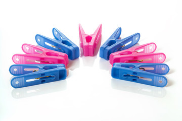 Colored clothespins, on a white background, close-up