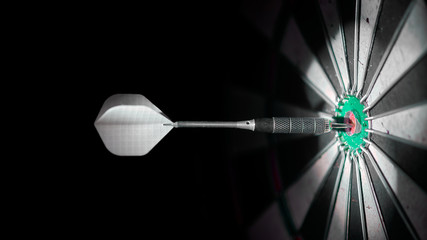 one dart in the center of a dartboard