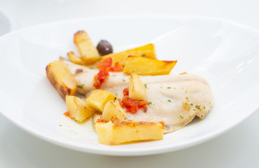 fish with potatoes, baked sea bream
