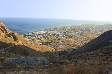 View of the village of Perissa on the island of Santorini extending from the trail leading to the...