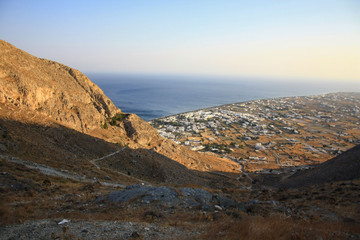 View of the village of Perissa on the island of Santorini extending from the trail leading to the peak of Profitis Ilias