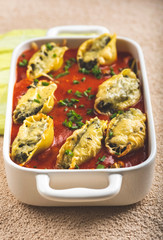 shell-shaped pasta stuffed with spinach and cheese