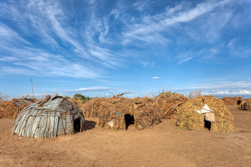 Poor huts in traditional african Dassanech village, Omo river, Ethiopia indigenous people houses