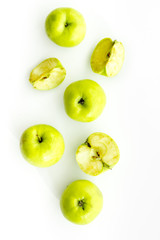Autumn composition with green apple on white background top view