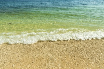 Beautiful view of foaming wave coming on sandy beach. Atlantic ocean. Beautiful nature landscape backgrounds. 