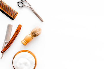 Men's hairdressing tools on white background top view copy space